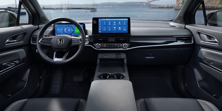 2026 Honda Prologue Elite interior with Gray Leather, featuring the cabin with dashboard and steering wheel.