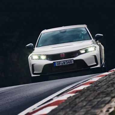 2026 Honda Civic Type R in Championship White, on a racetrack